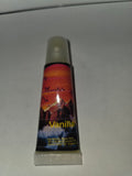 Vanilla lip balm squeeze tube with cap on and label facing forward