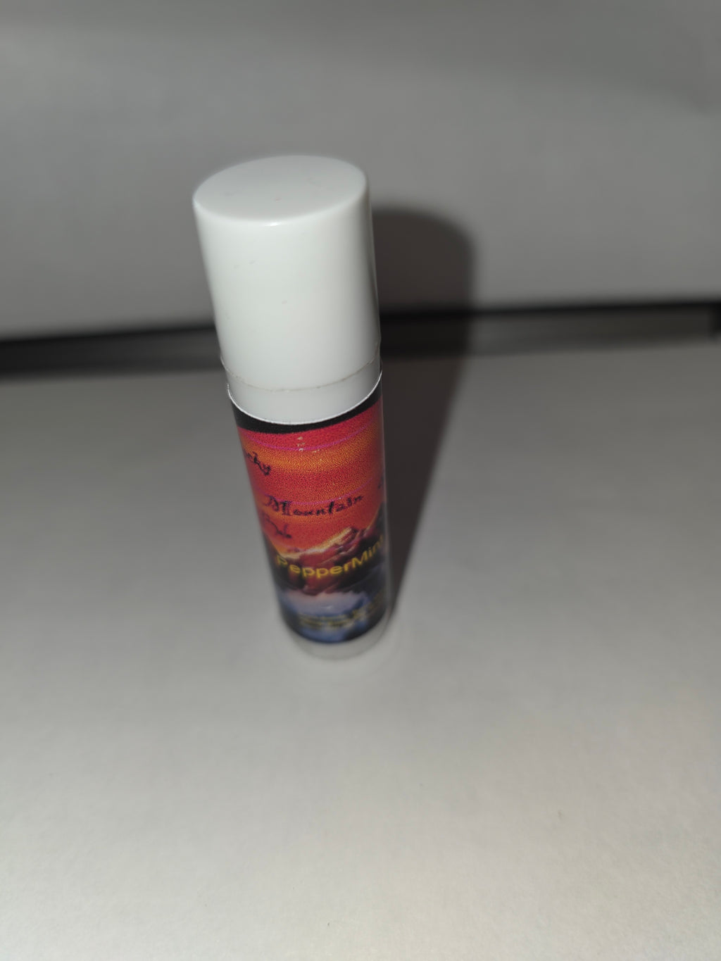 Peppermint Lip Balm with cap on
