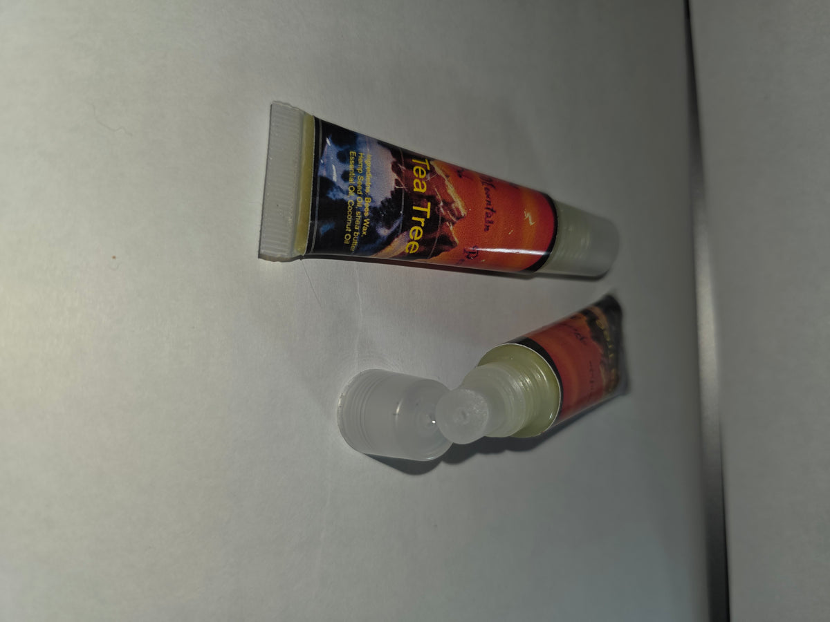 Tea Tree Lip Balm squeeze tubes showing closed packaging and open applicator