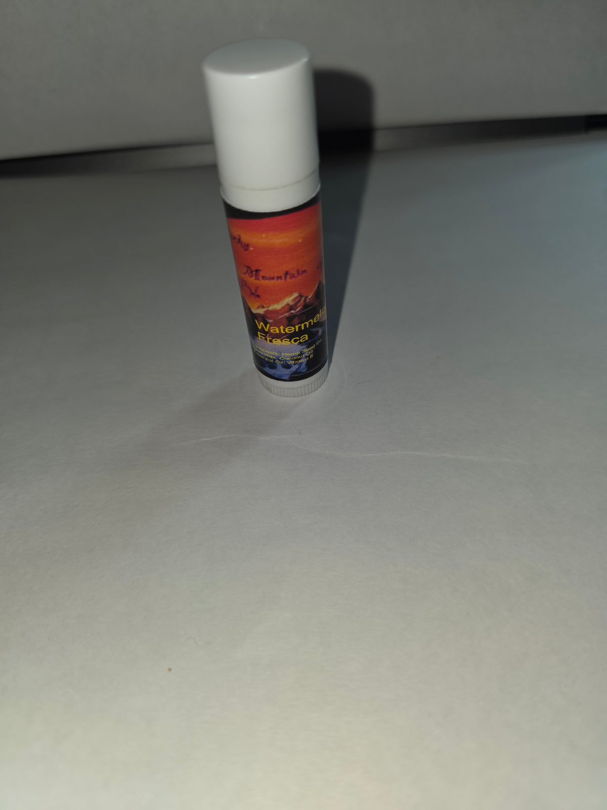 Watermelon Fresca Lip Balm twist tube with cap closed