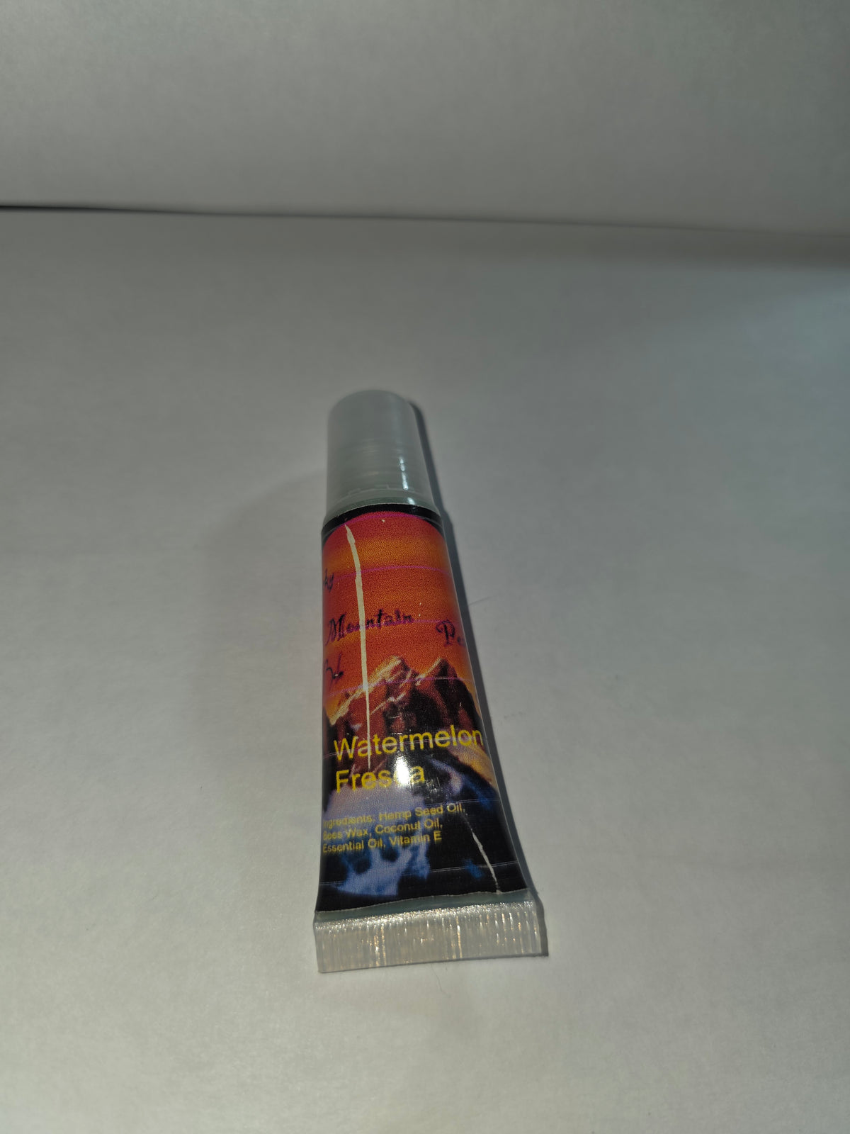 Watermelon Fresca Lip Balm squeeze tube with cap closed