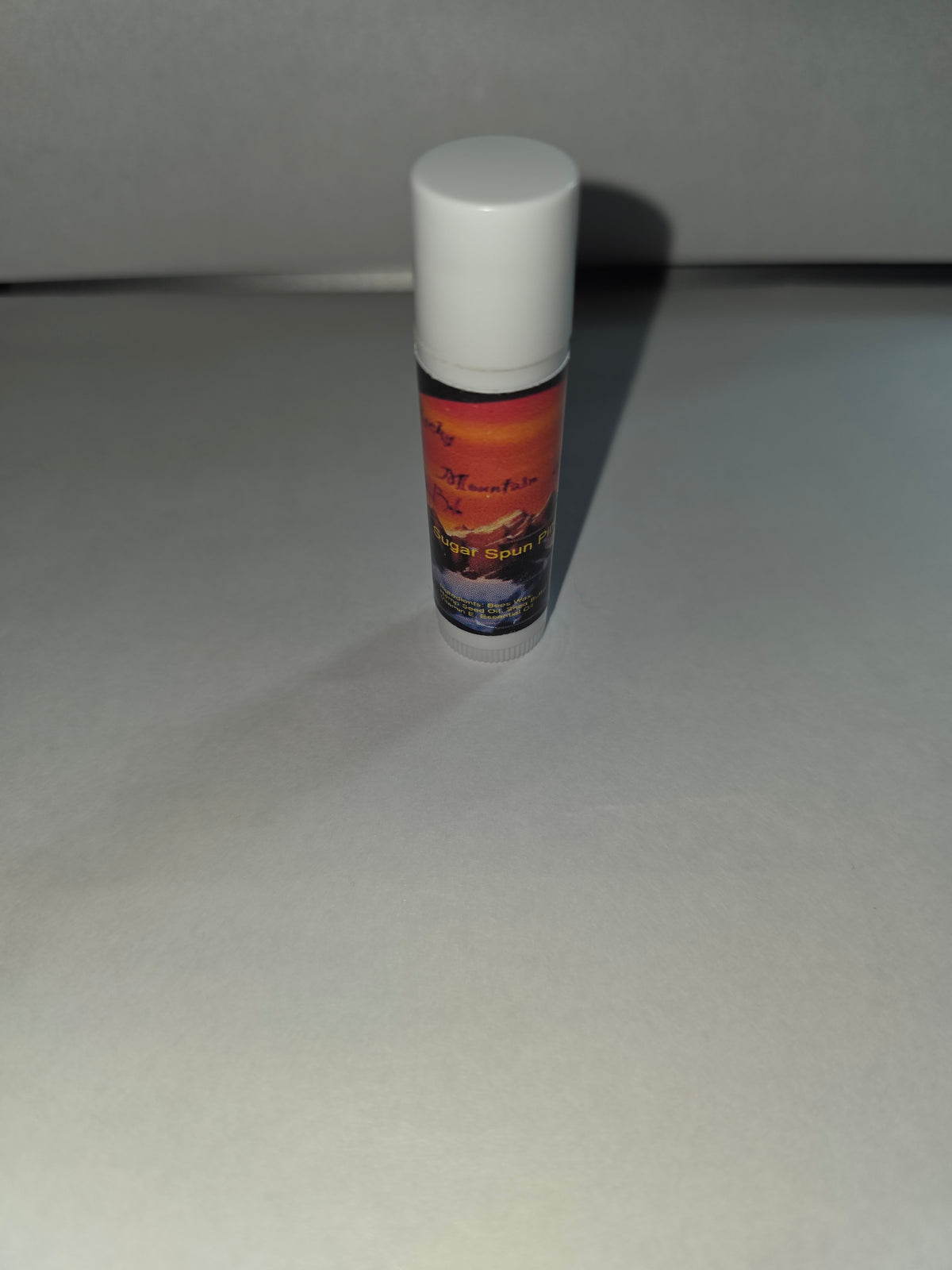Sugar Spun Pineapple Lip Balm twist tube with cap on