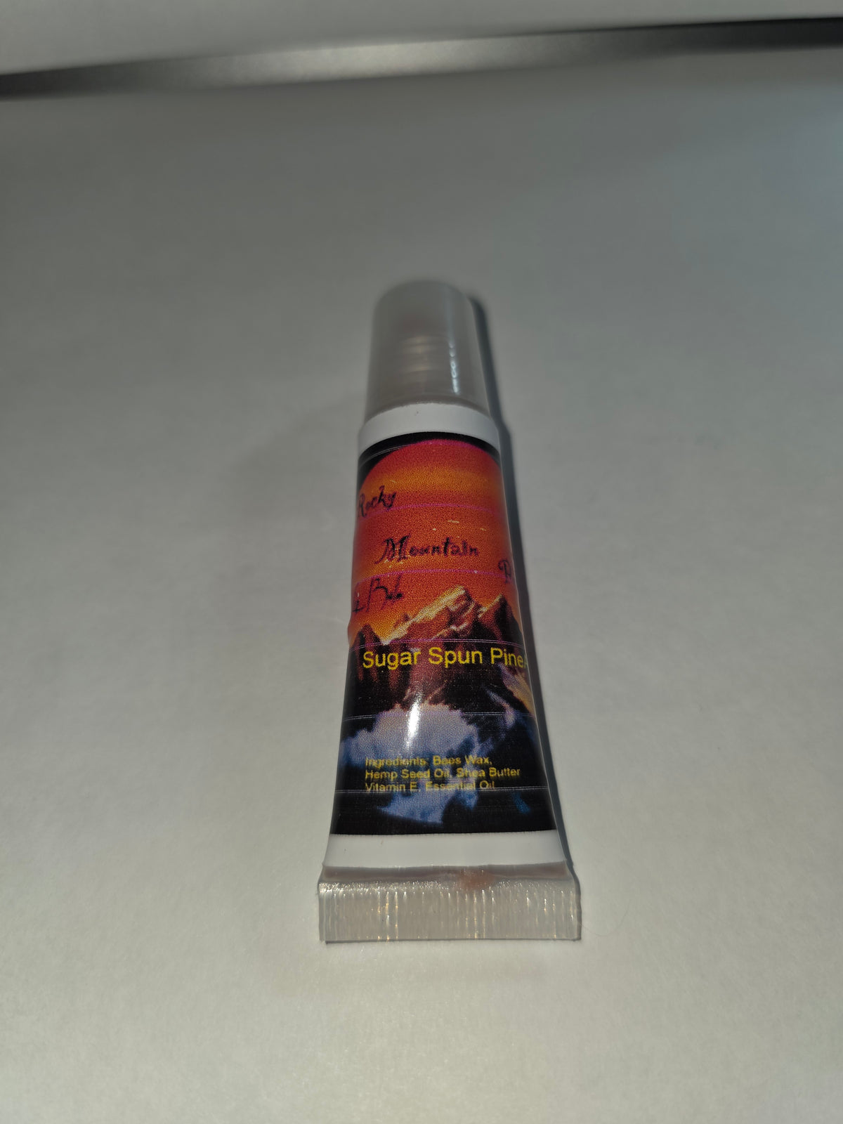Sugar Spun Pineapple Lip Balm squeeze tube with cap on