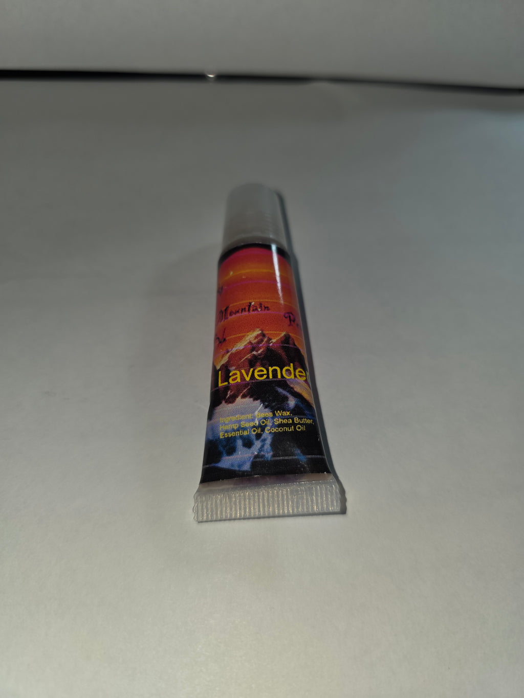Lavender Lip Balm squeeze tube with cap on