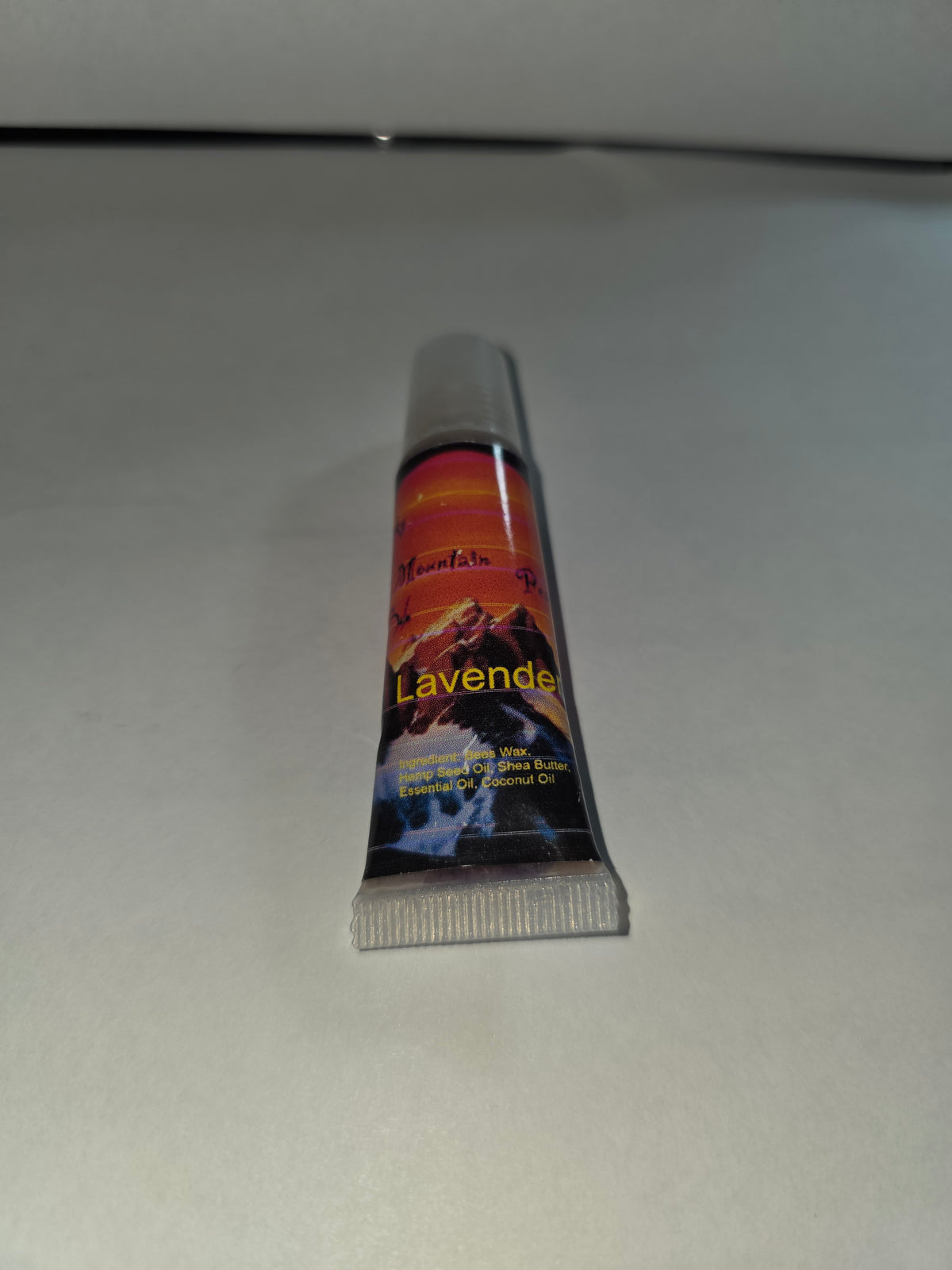 Lavender Lip Balm squeeze tube with cap on