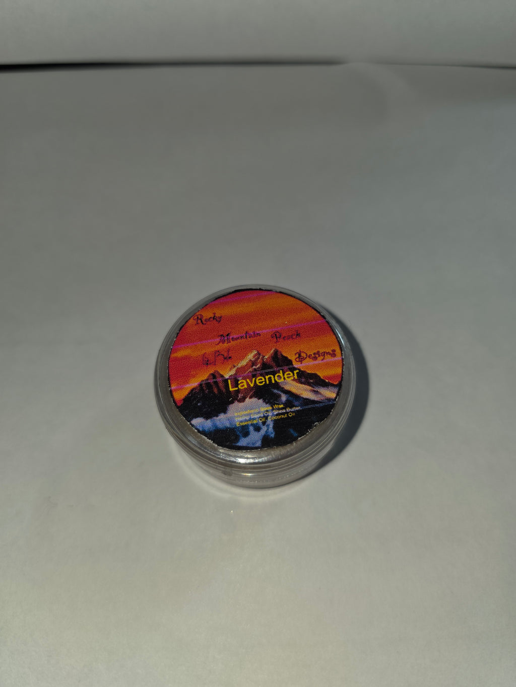 Closed Lavender Lip Balm canister with labeled lid