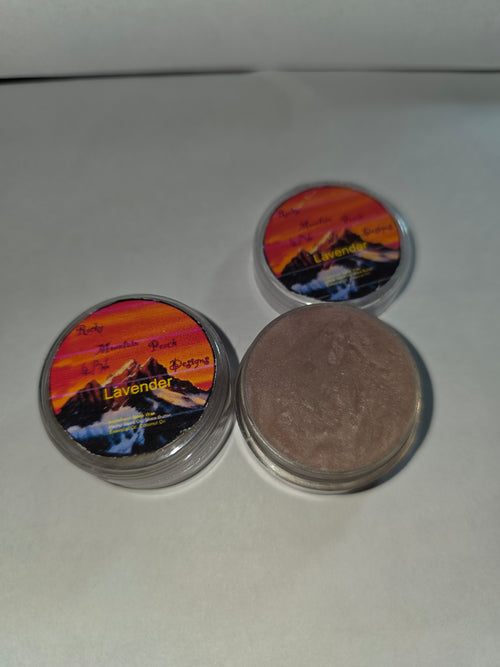 Lavender Lip Balm canisters with an open canister showing the balm